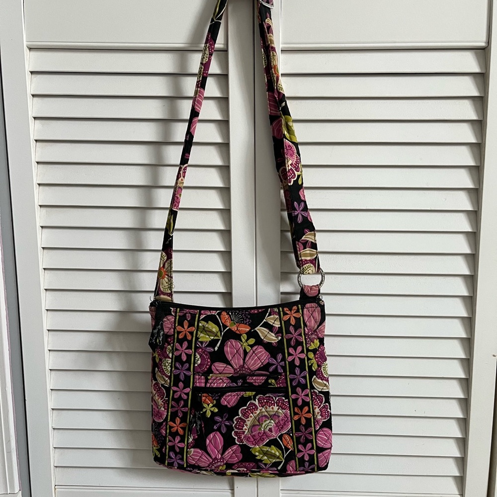 Vera Bradley retired crossbody bag. Good used condition w/ normal wear. 11x11x2.